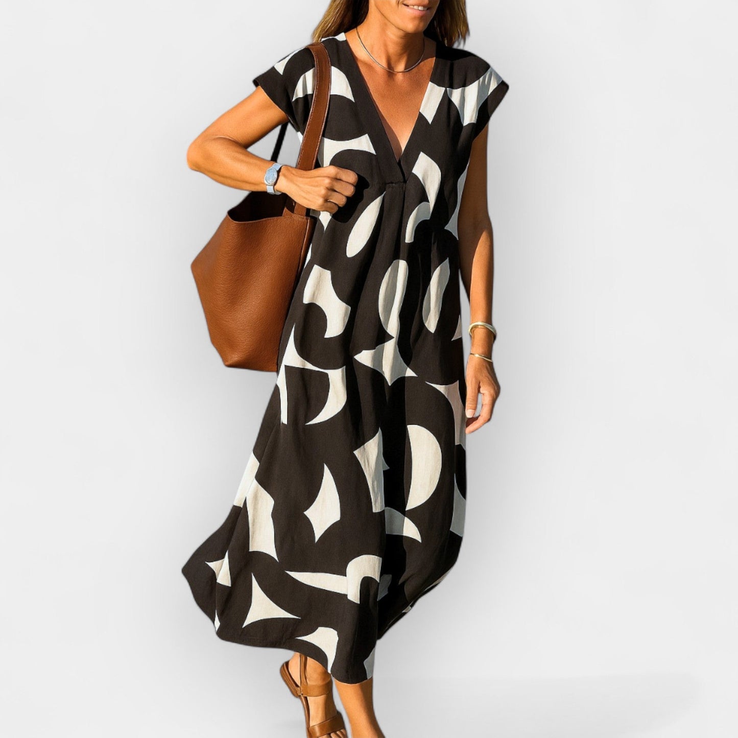 Airy Dress with V Neckline and Modern Design